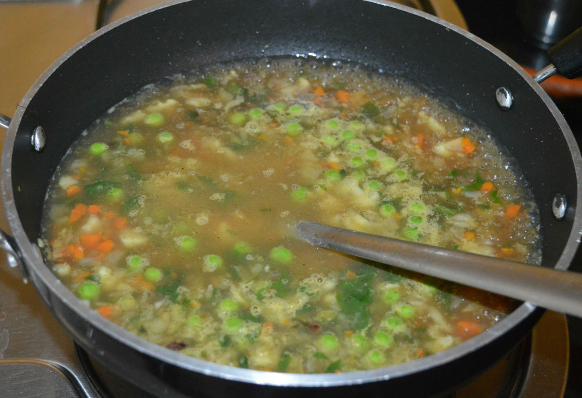 Step three: Add vegetable stock or water. Boil the mixture for 3 minutes.