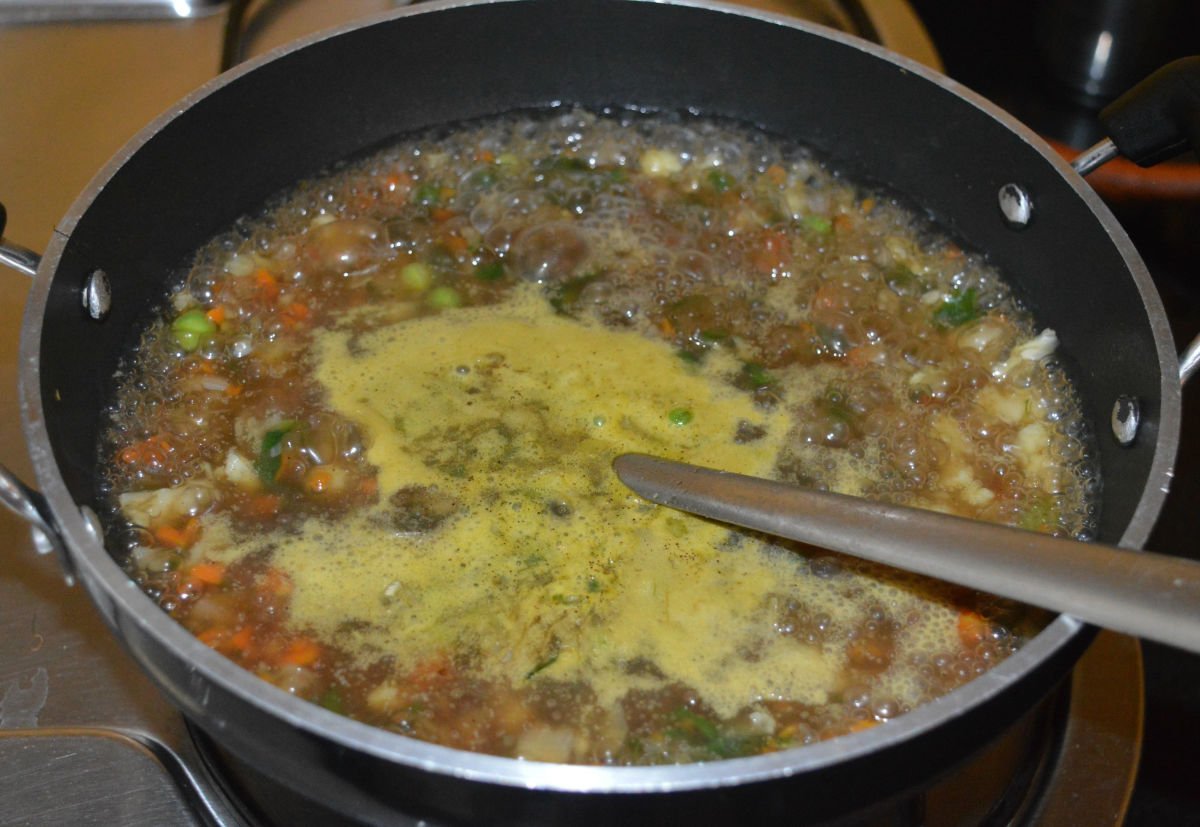 Step four: Add the cornflour-soy sauce mixture.
