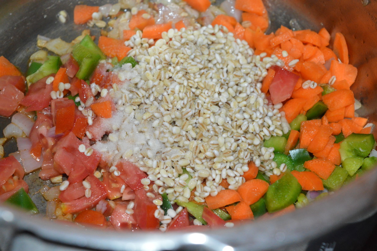 Step two: Add all the vegetables, soaked barley, and salt. Mix well. Saute for 2 minutes.
