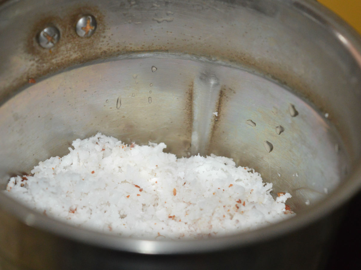 Step one: In a mixer jar, add 1 glass grated coconut and 1 glass water. Just whip it a few times. 
