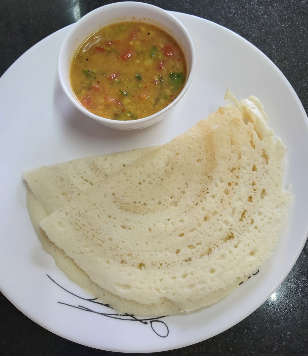 Serve hot sambar with idli or dosa. It also goes well with other breakfasts like uttapam or vada.