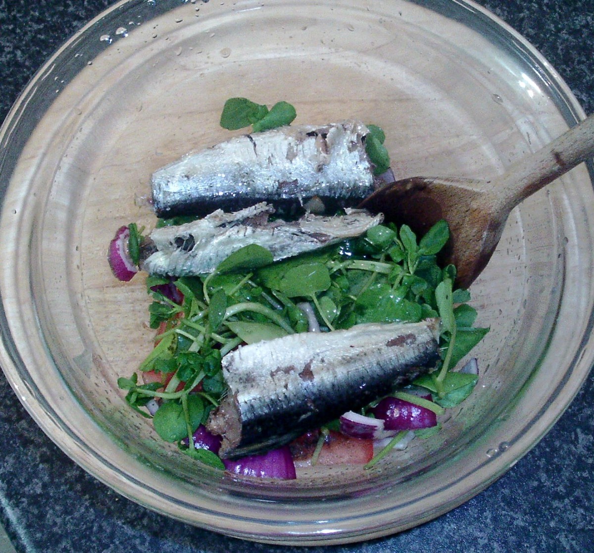 Sardines are added to watercress salad