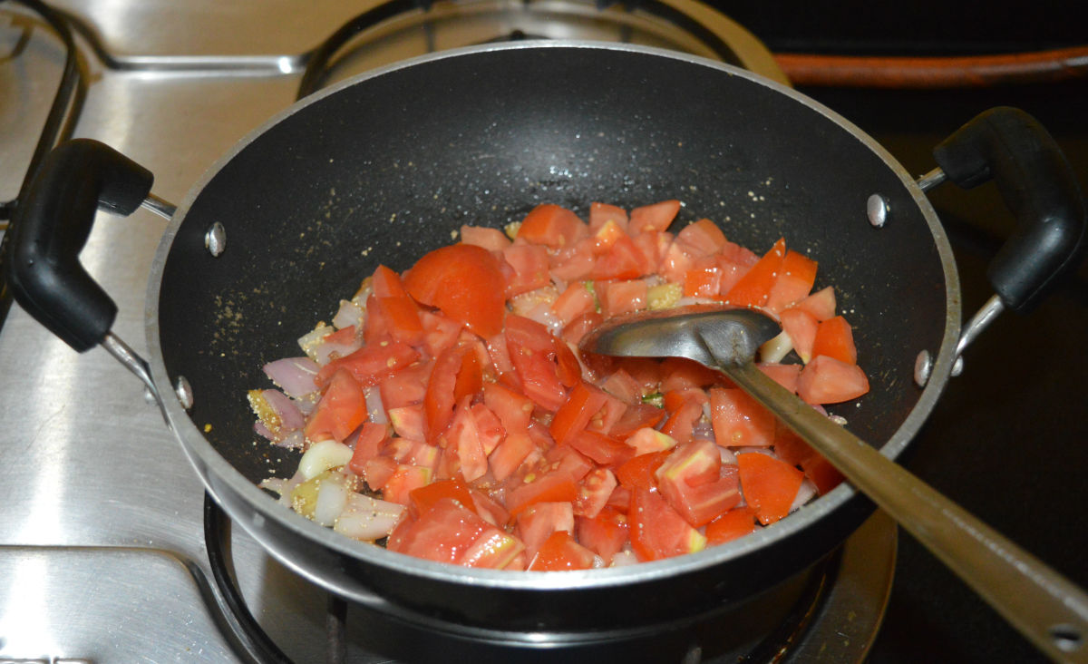Add chopped tomatoes and some salt. Continue to saute for 4-5 minutes.