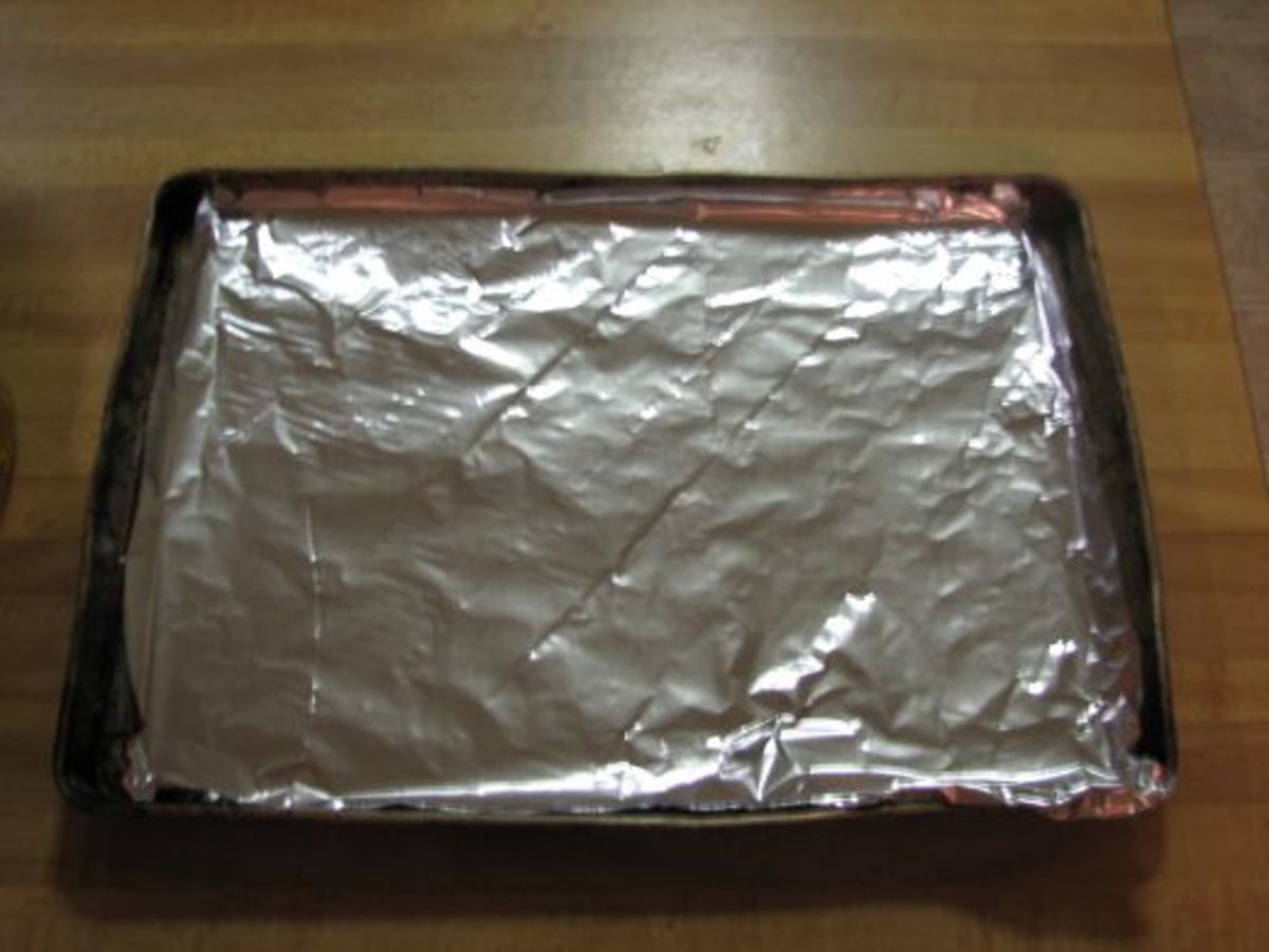 Cover the cookie sheet with a sheet of heavy duty tin foil