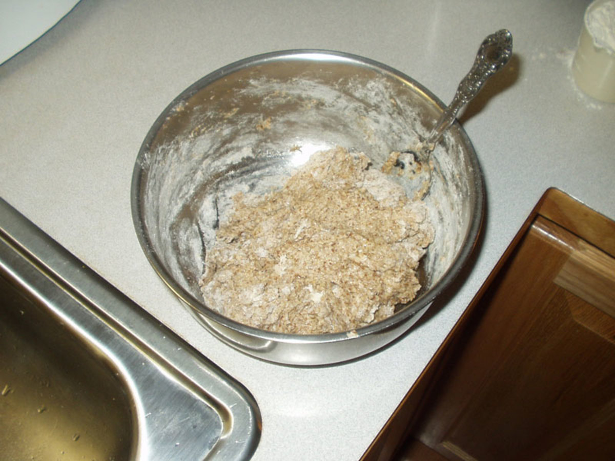 Step 3: Mix in the honey, oil, salt, warm water. Add flax seed meal, whole-wheat flour and 1 c bread flour. Mix into a sticky dough.