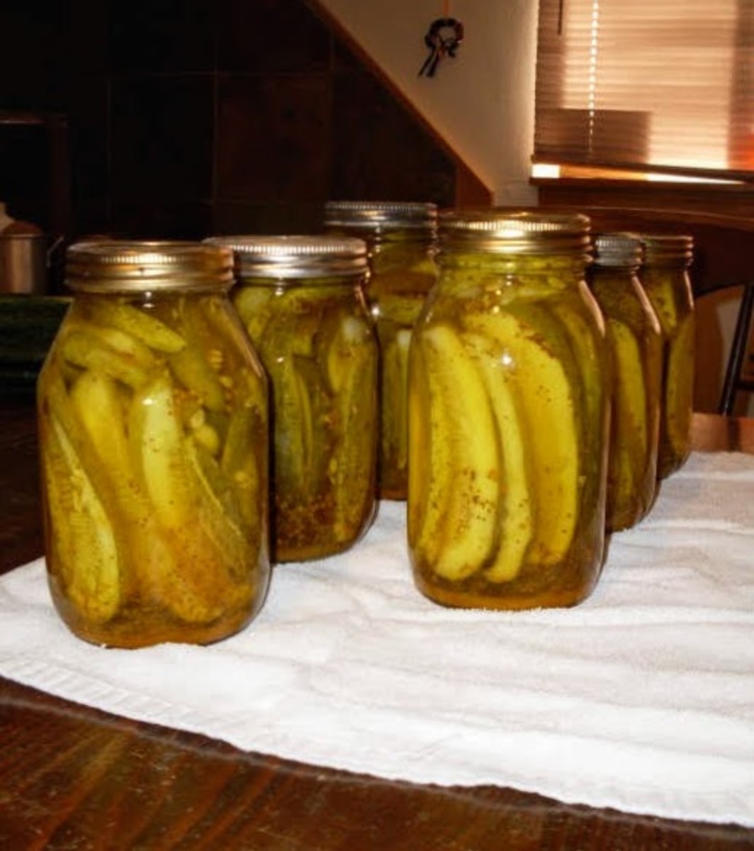 Let sit overnight. Jars often "pop" or "ping" as they seal. Wash outsides of jars with mild, soapy water to remove any hard water stains or pickling residues.