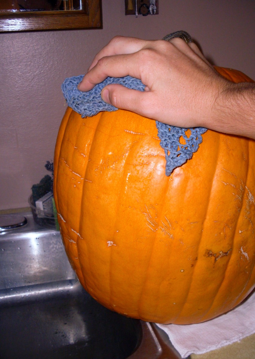 Wash the squashes or pumpkins with a nice scrubbing cloth and tap water. You may use a bit of soap if they are filthy; rinse thoroughly.