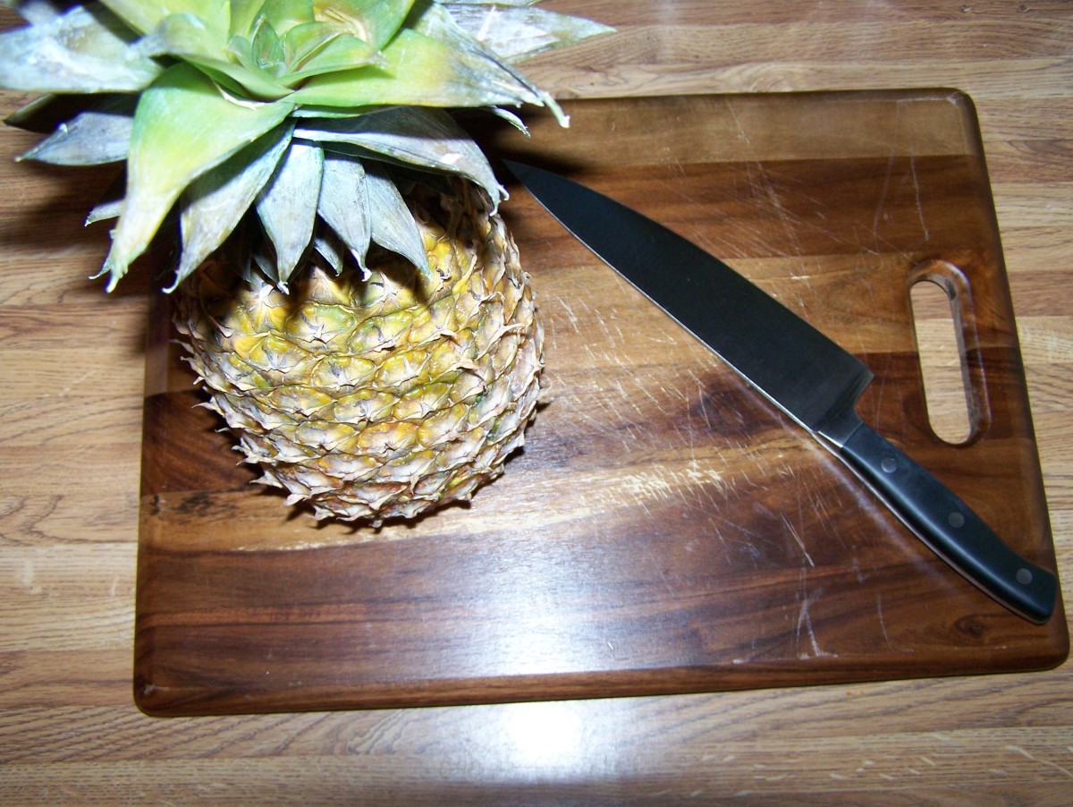 No special gadgets needed, only a pineapple, large sharp knife, and a cutting board.