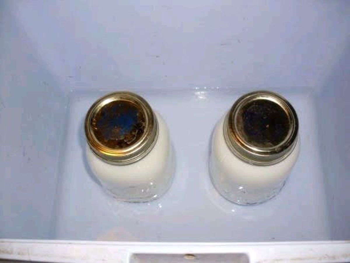 Adding hot water to the bottom of a cooler usually maintains temperature long enough.