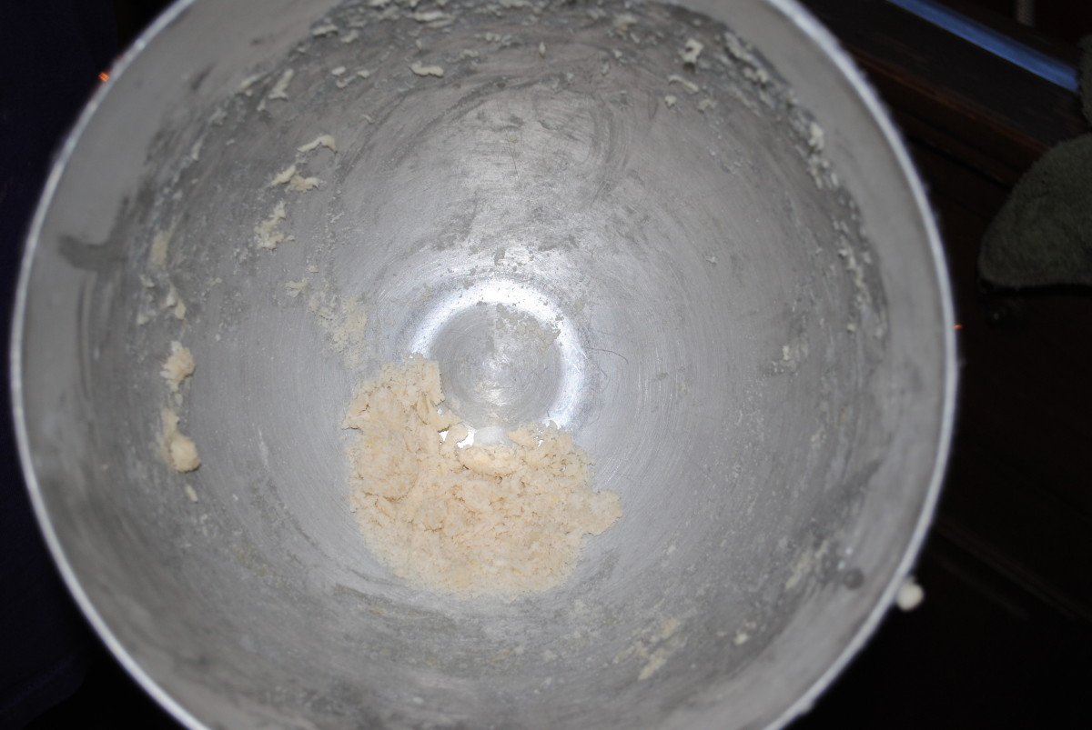 After the dough has come together like in the previous picture, turn it out on a floured surface to knead. If you have little sniglets left over like this - ignore them. Leave them alone - they don't matter.