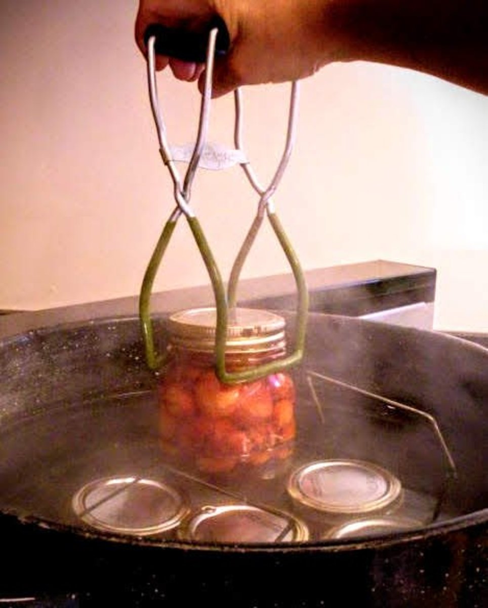 Using a jar lifter, remove jars to a heat-resistant and draft-free surface. (Use a towel for most surfaces.)