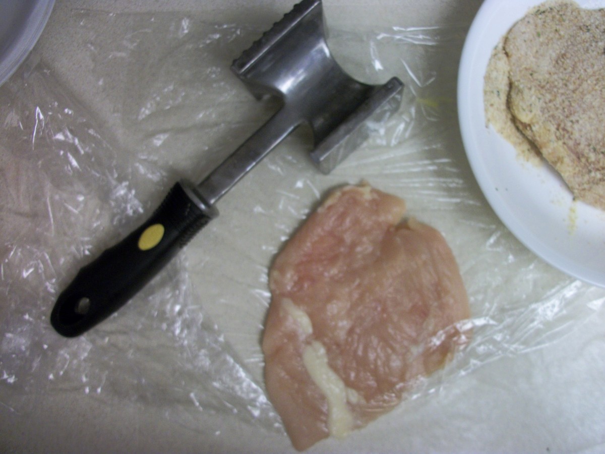 Use the flat side of a meat mallet to pound chicken breasts to a relatively uniform thickness