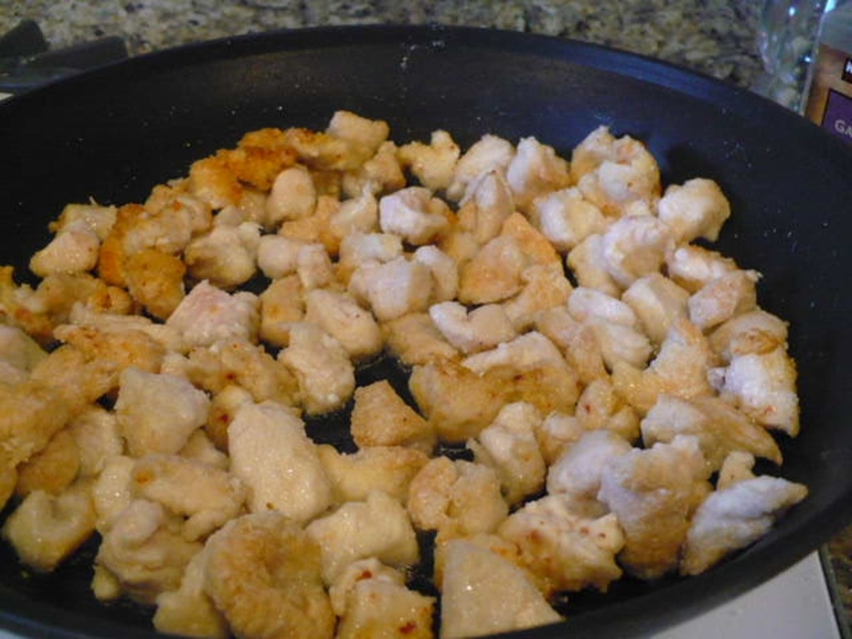 Fry lightly coated chicken until they're golden brown to give some crisp to the dish. In restaurants, they usually deep fry the chicken, but I use an inch of oil instead—less oil, same effect.