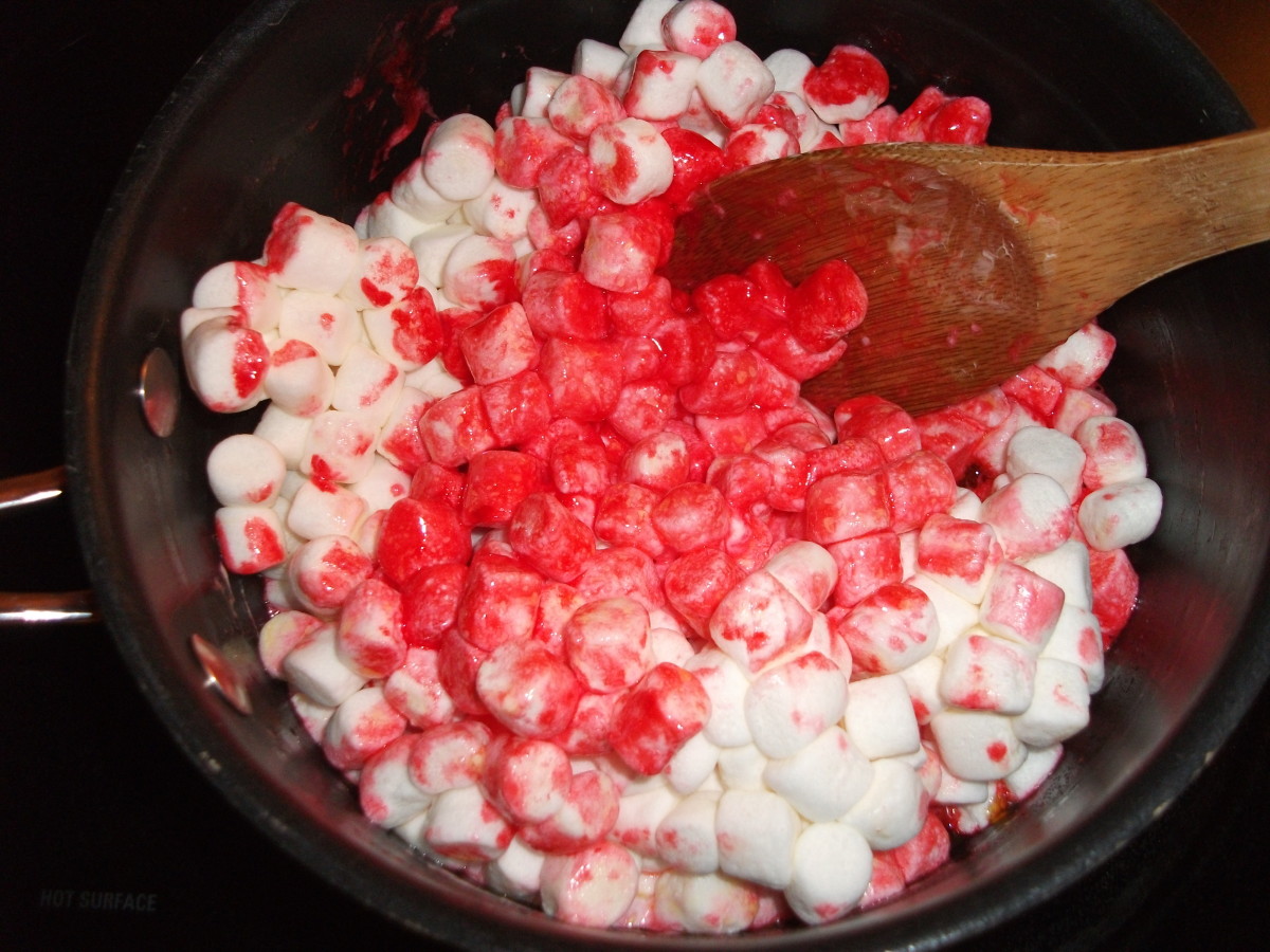 Add food coloring as you melt the marshmallows.