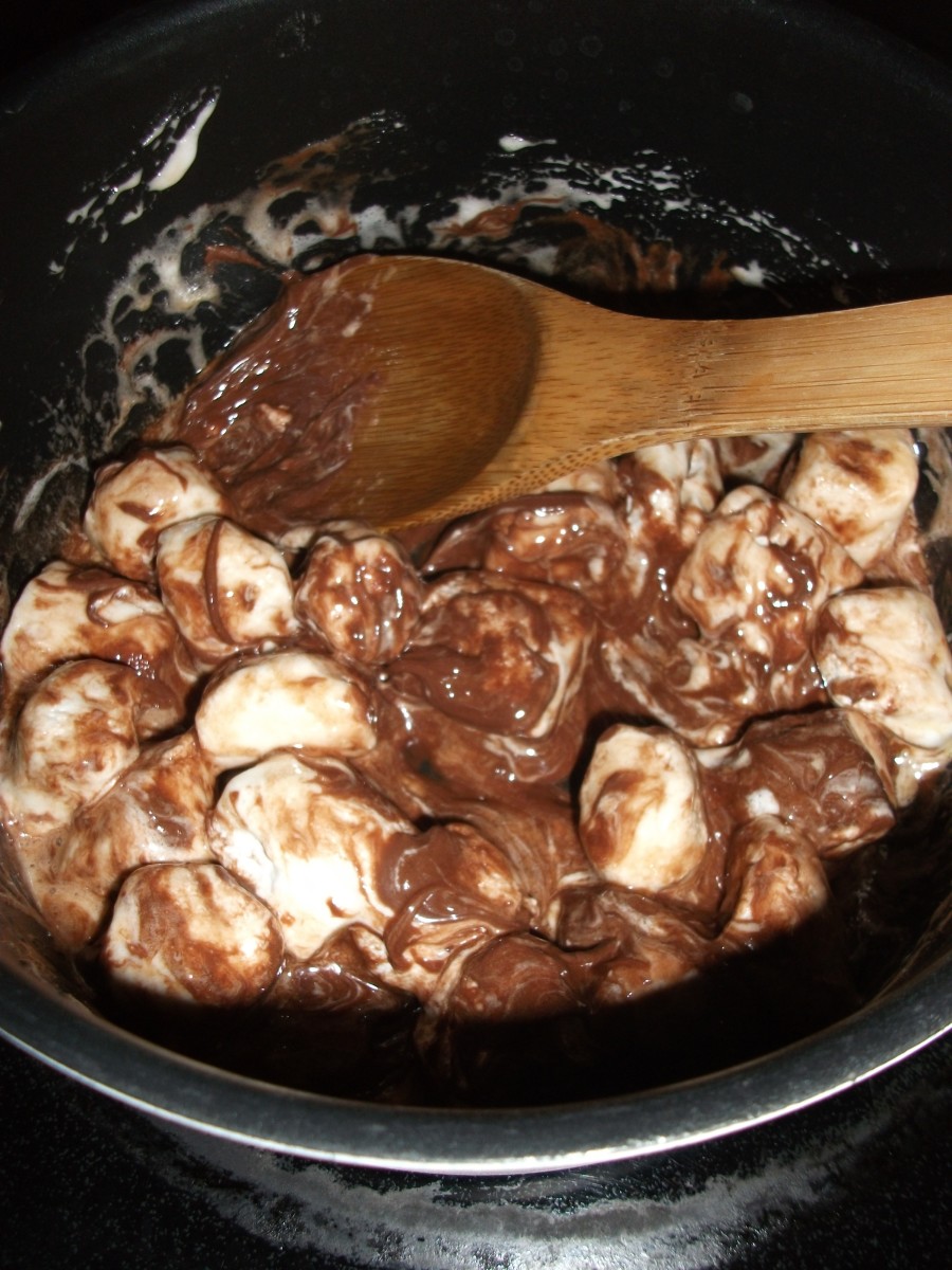 Mix the Nutella in as the marshmallows are melting.