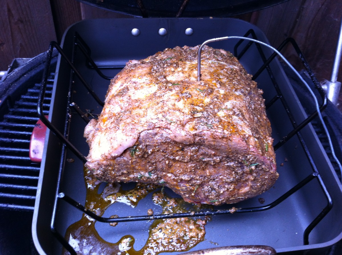 Placing the rib roast on the kamado grill