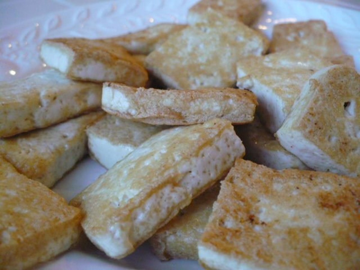 Golden brown tofu ready to be tossed and appreciated! So good, you can actually just eat this with some dipping sauce.