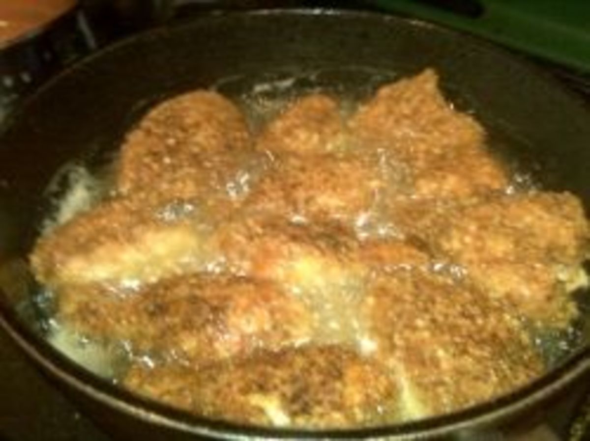 Frying chicken.