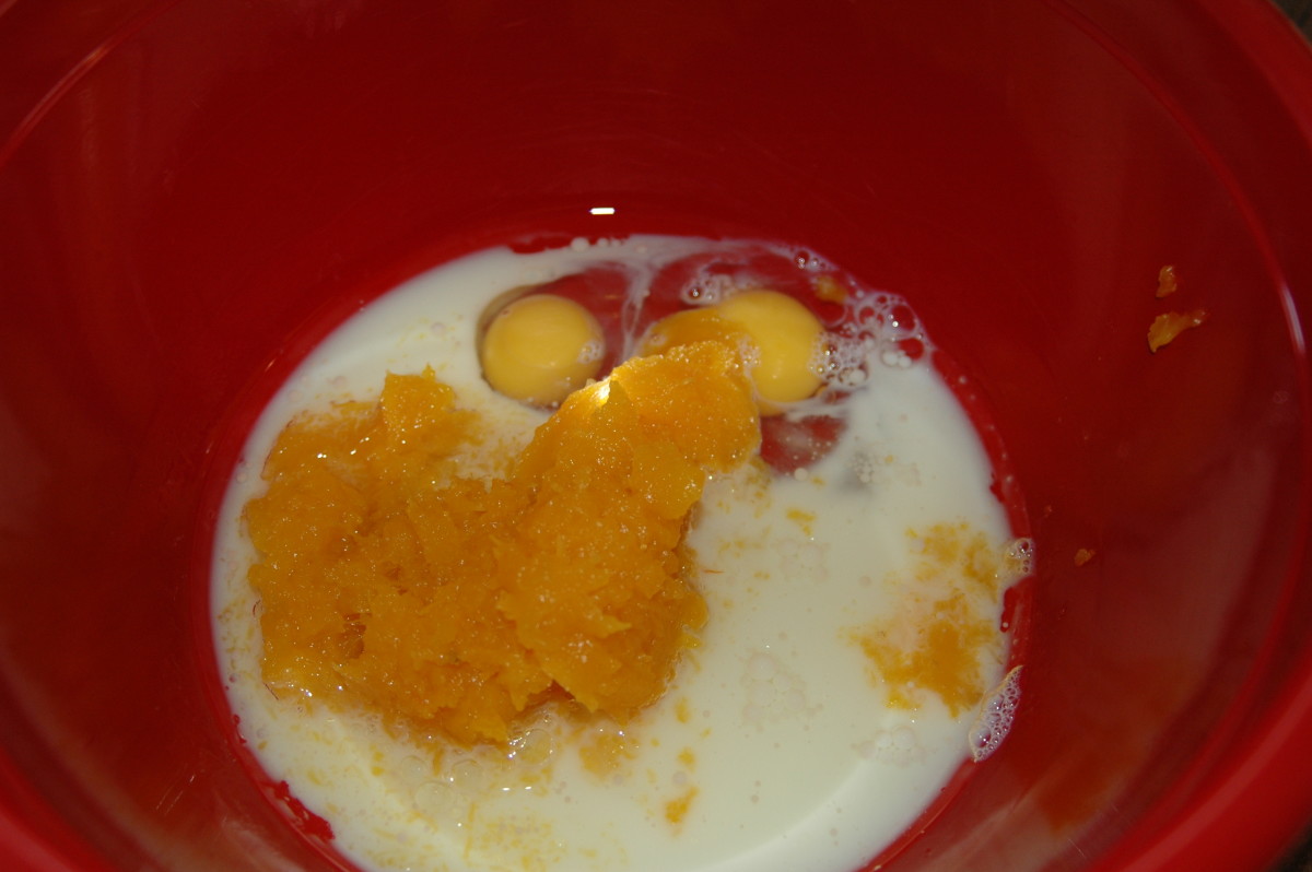 Combine eggs, milk, oil, pumpkin, sugar, sauerkraut, spices, and vanilla in a large bowl. Whisk to combine.