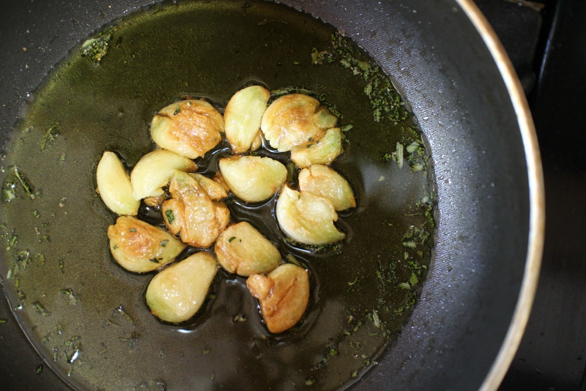 The garlic, rosemary, and cloves simmering for the garlic paste