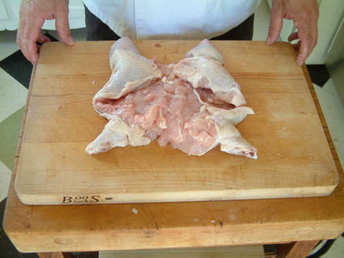 Removing the backbone allows you to open the bird to expose more of the skin to heat, or to stuff and roll the bird as you choose.
