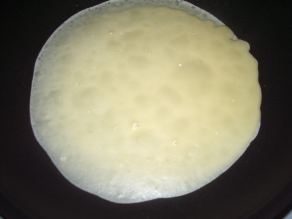 Once in your skillet, this is what the crepe batter looks like at the beginning.