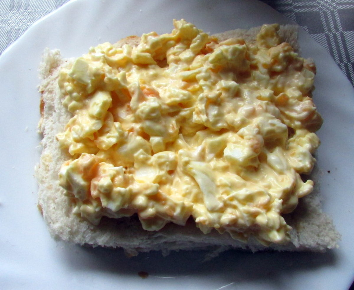 Spread the egg salad on bread for a delicious sandwich.