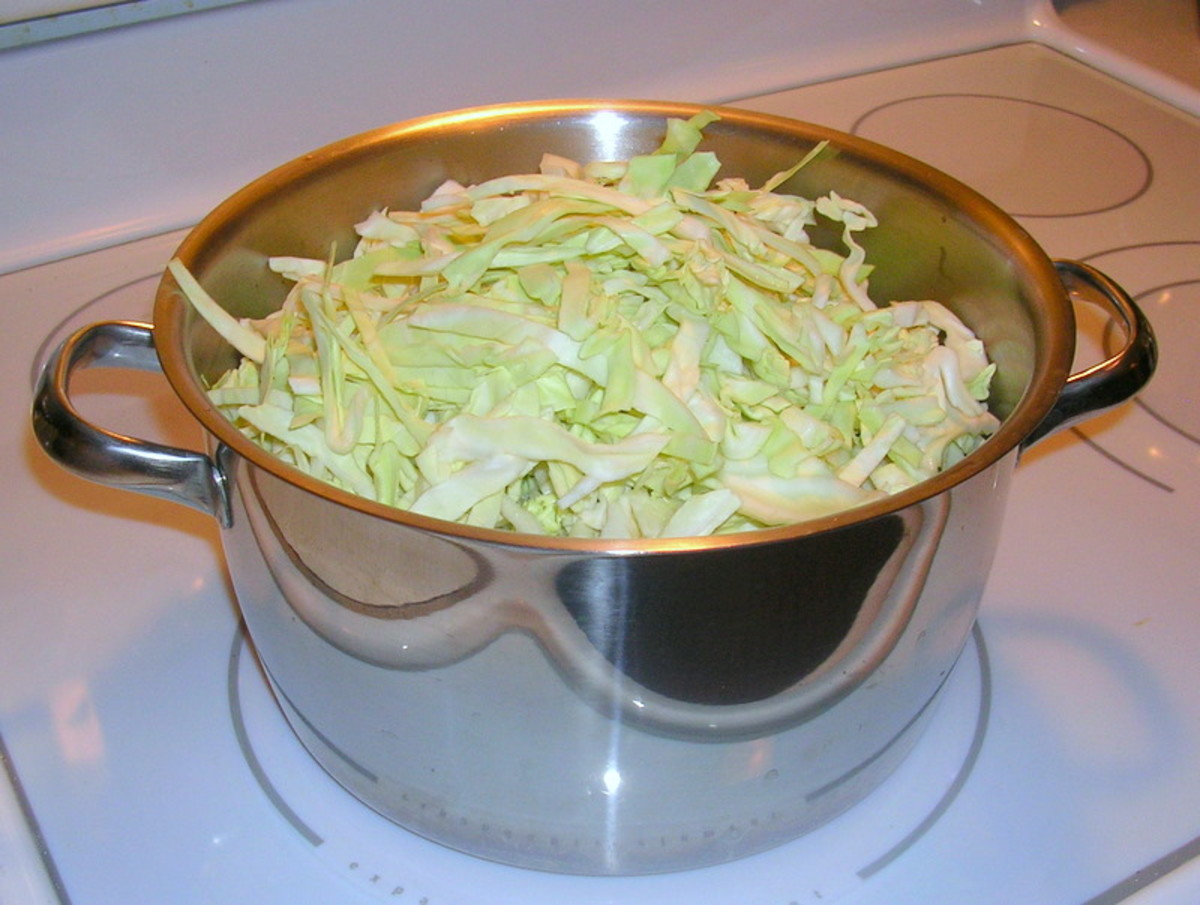 By the time the kielbasa and cabbage are done, the volume of cabbage will have decreased by about half.