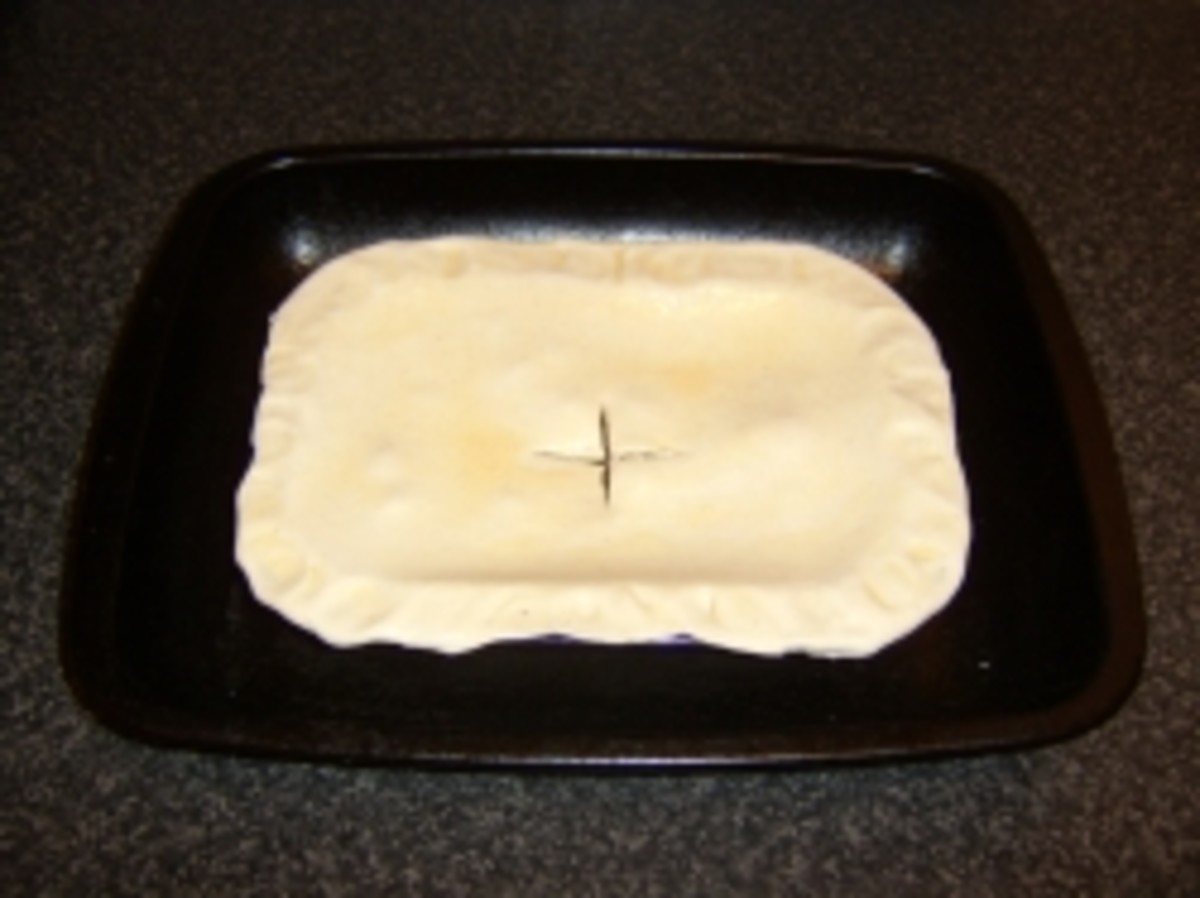 The steak and kidney pie is ready for the oven.