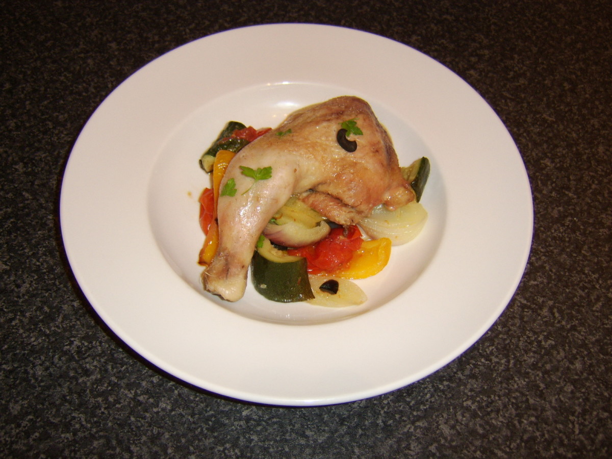 Each chicken leg portion is served on a bed of Mediterranean vegetables