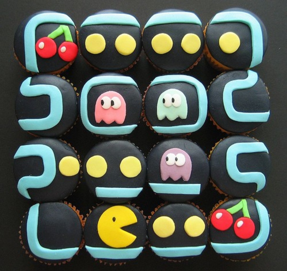 The fondant on these Pac-Man cupcakes is perfect. If you're looking to turn these cupcakes into something a little more suited for couples adding Ms. Pac-Man will definitely do the trick!