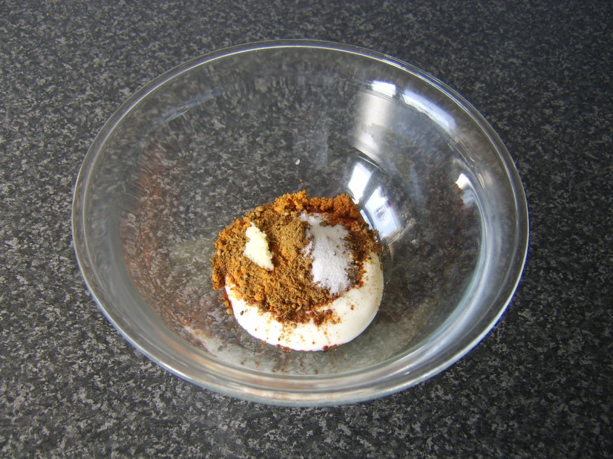 The tandoori curry powder and other spices are stirred into the plain yoghurt