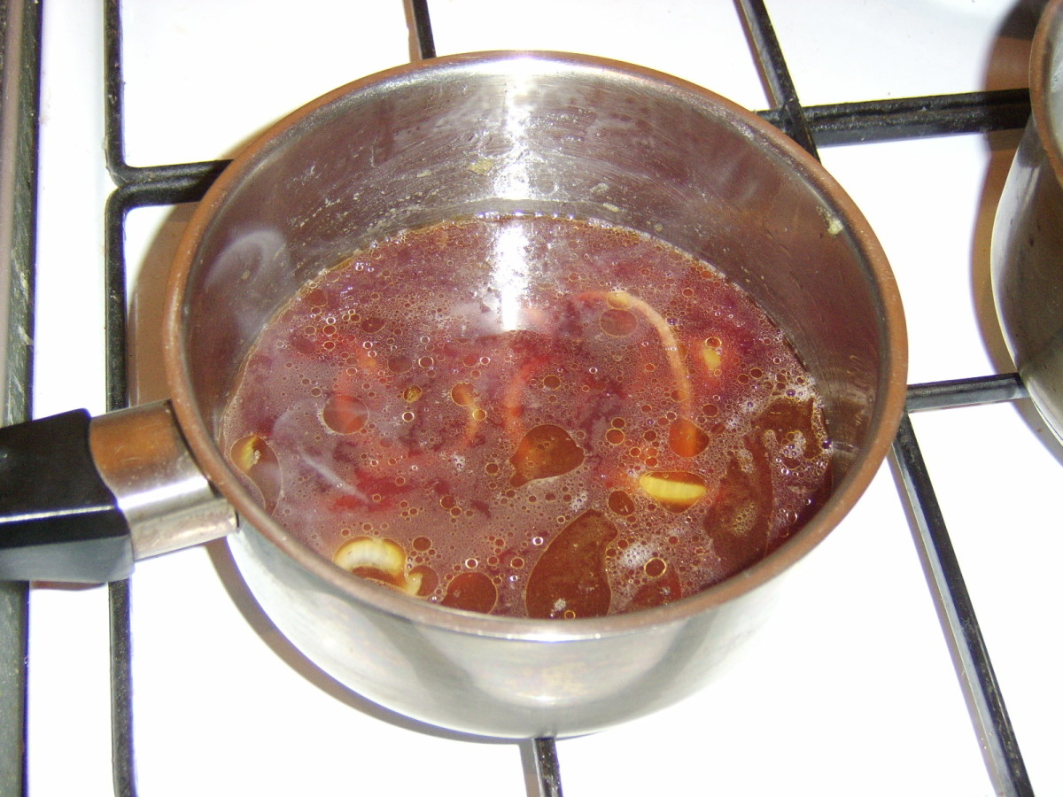 Red wine and fresh beef stock are added to the caramelised onions
