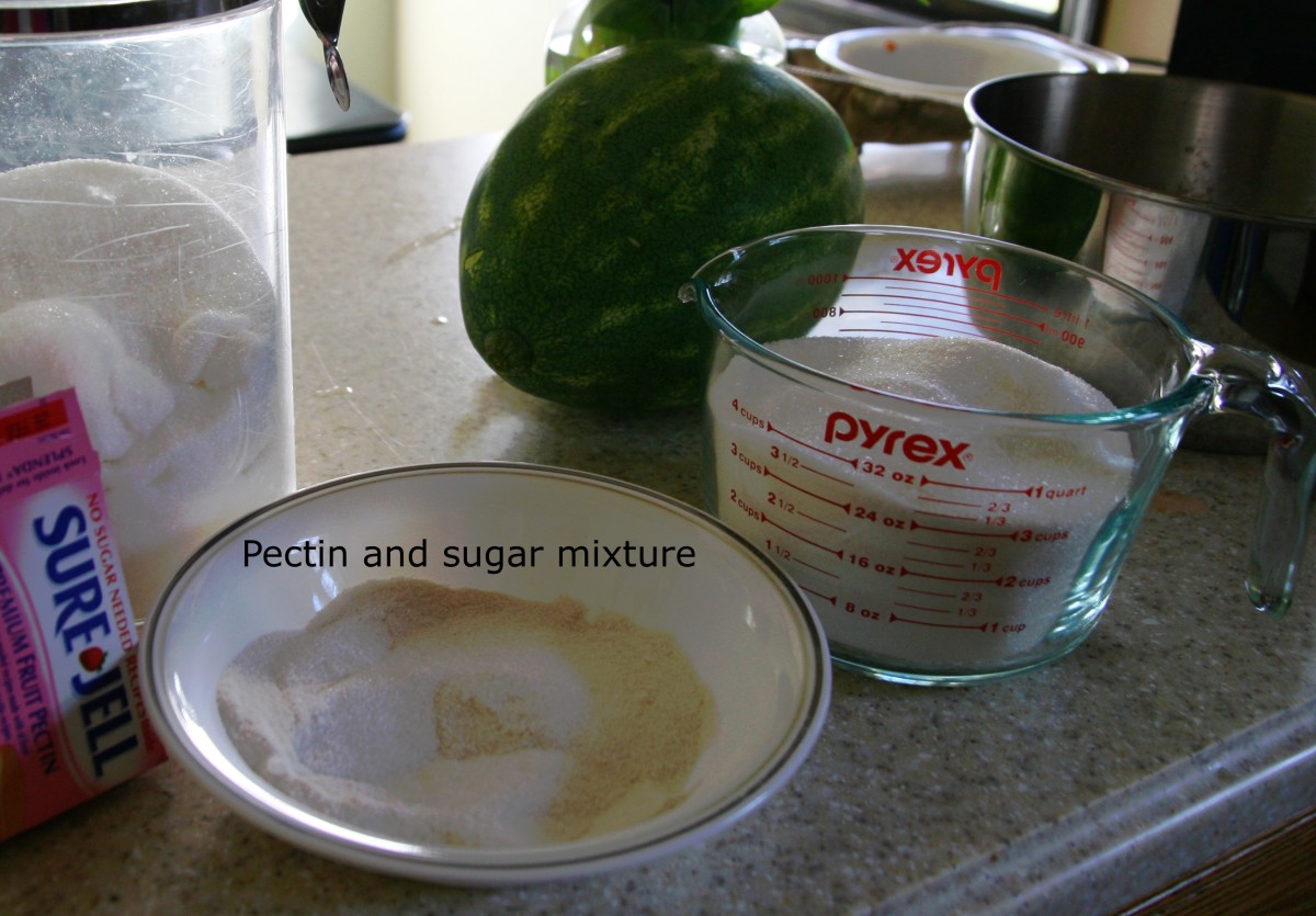 No-sugar or low-sugar pectin has a tendency to clump when added to a recipe. To prevent this from happening, mix 1/4 cup sugar with the pectin prior to adding it to the watermelon puree.