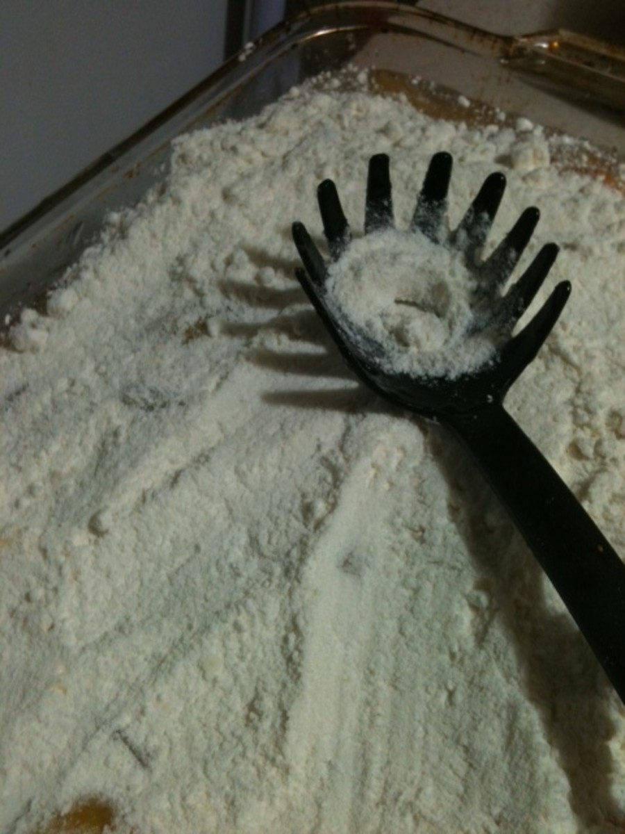 Using the back of a spoon or a spatula, level the cake mix.