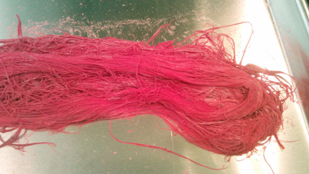 Dyeing the corn syrup will yield colored hair. Here, I used red dye for bright pink hair.