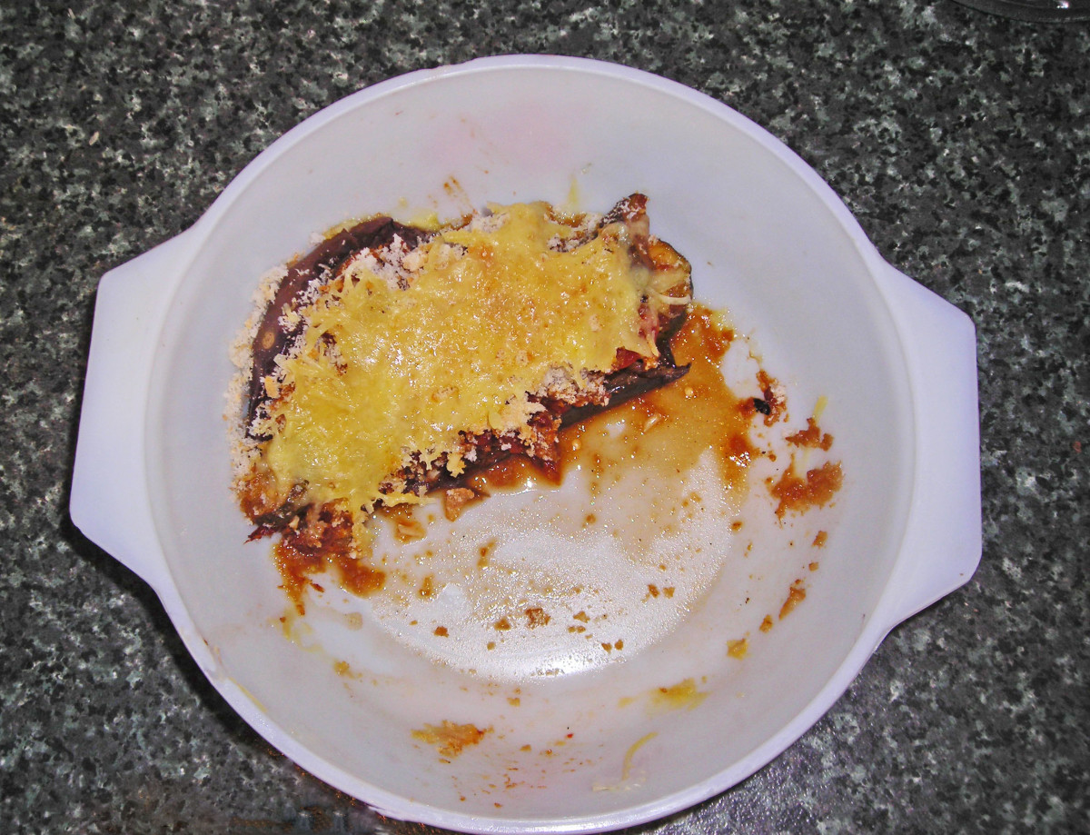 Stuffed eggplant cooked and partially eaten, because I forgot to take a photo when it was first served up.