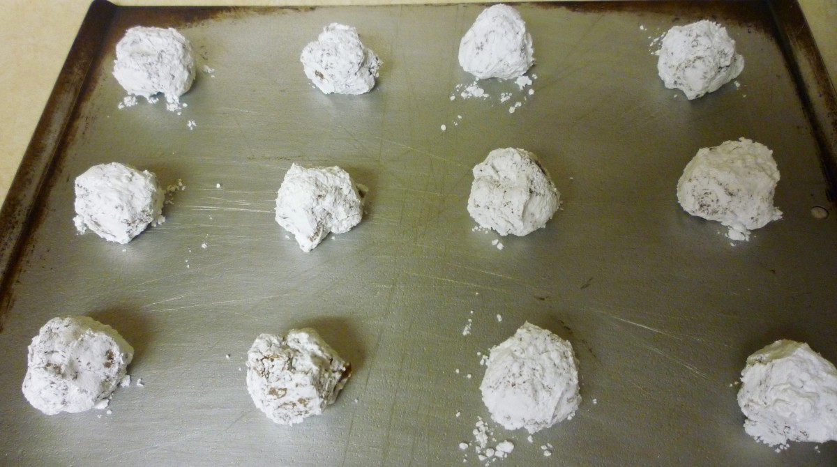 Sugared balls put onto baking sheet