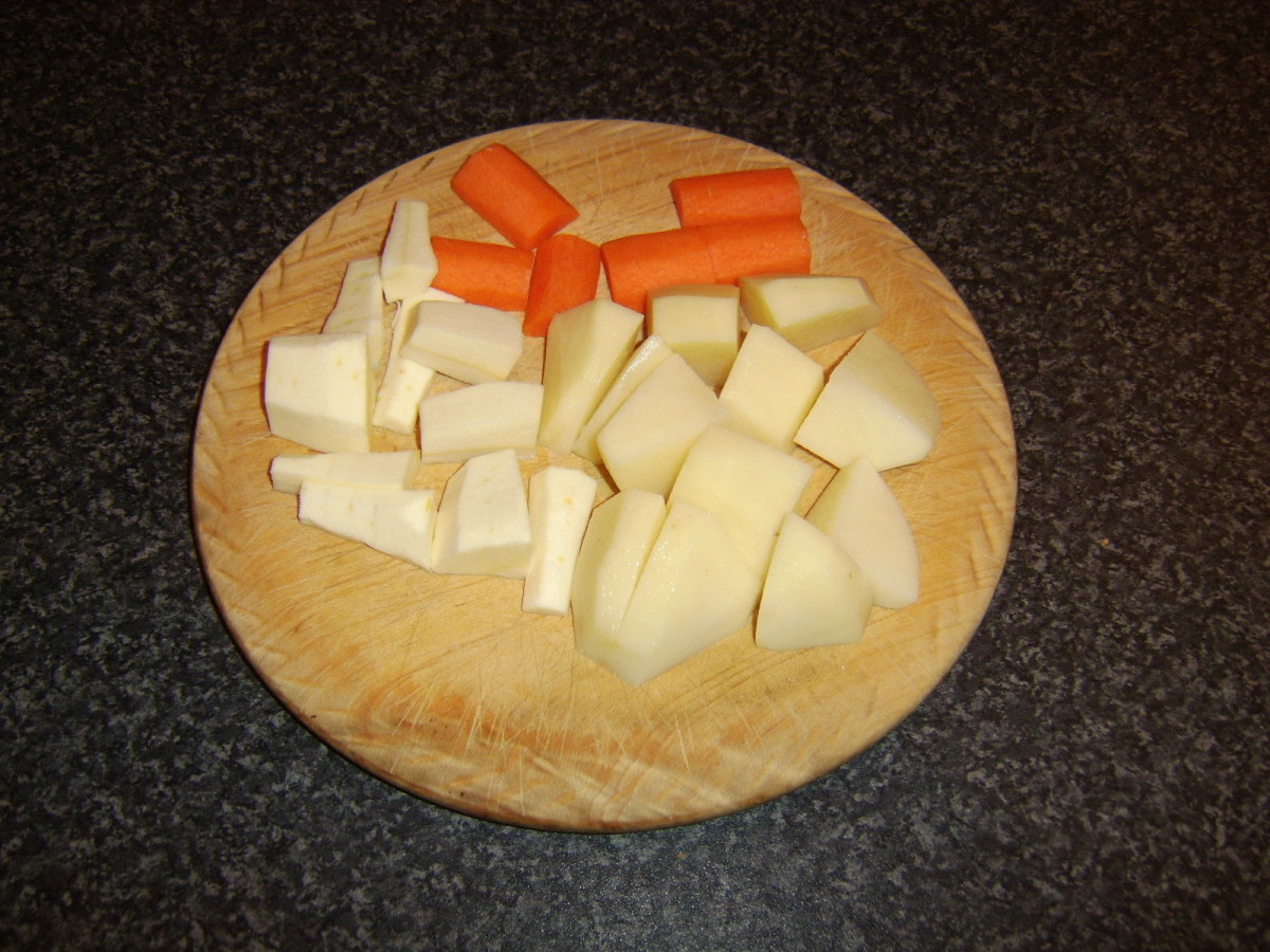 Carrot, parsnip and potato are roughly chopped for the beef and ale stew