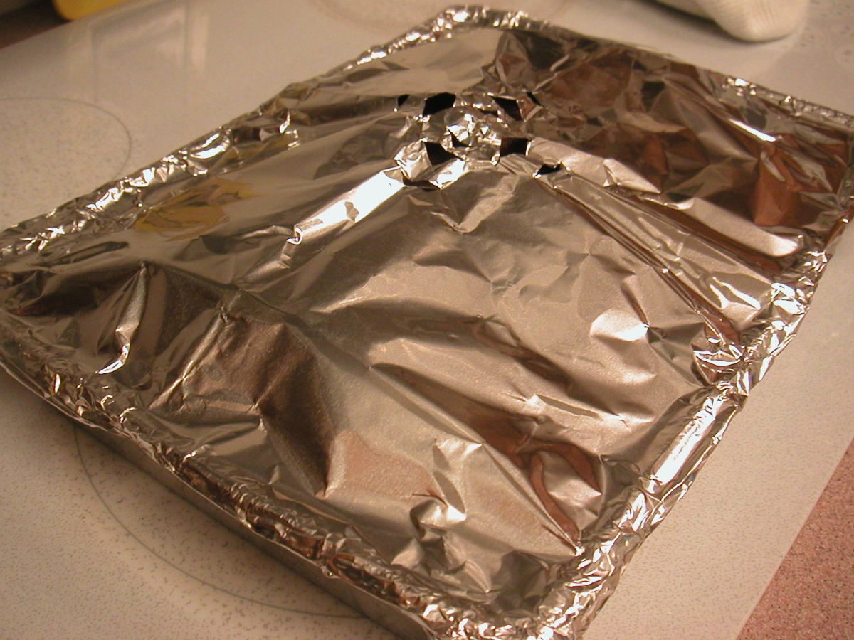 Cover the squash with aluminum foil. Cut holes to allow the steam to escape