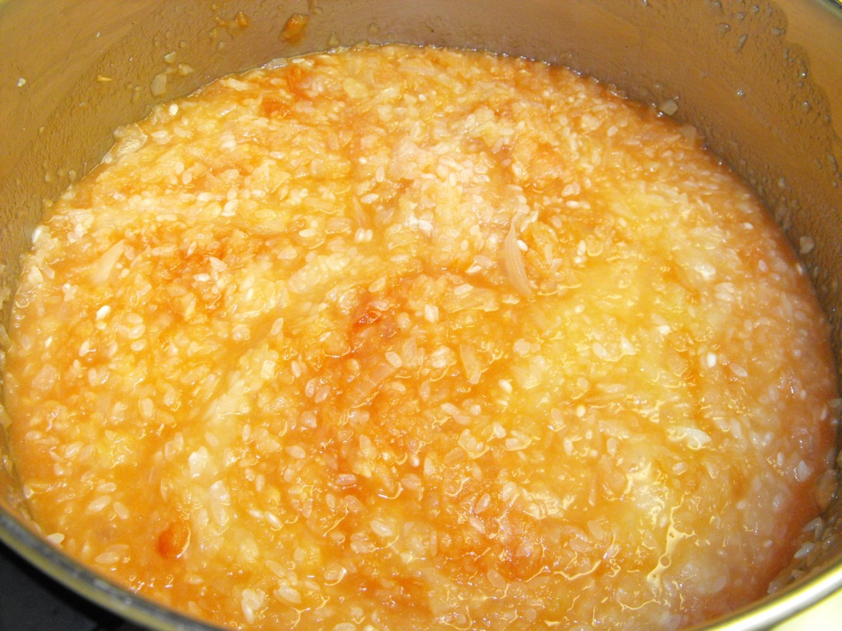 Add tomato sauce to the cooked onion/rice mixture and stir.  