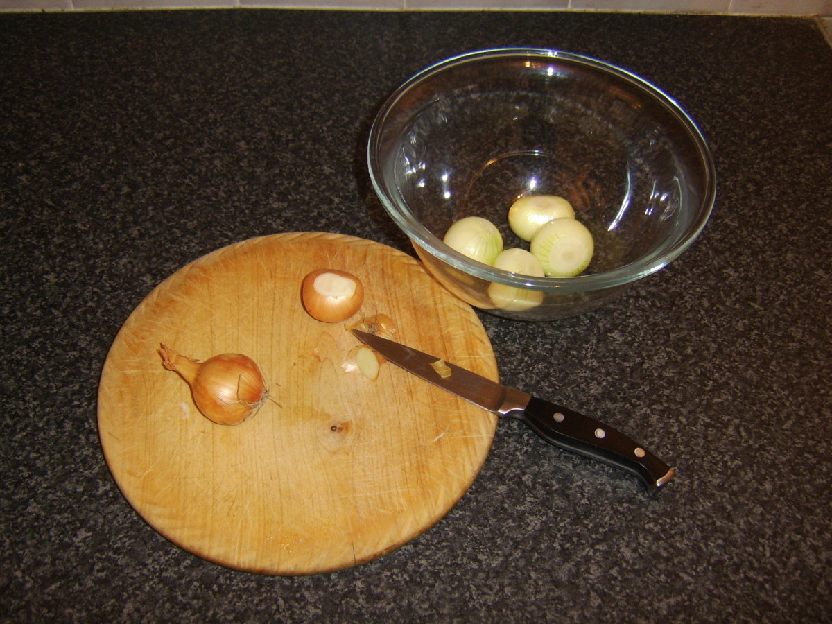 Peeling onions for pickling.