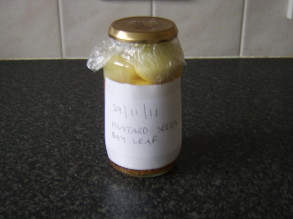 The pickled onions are labelled with the pickling date and spice mixture.