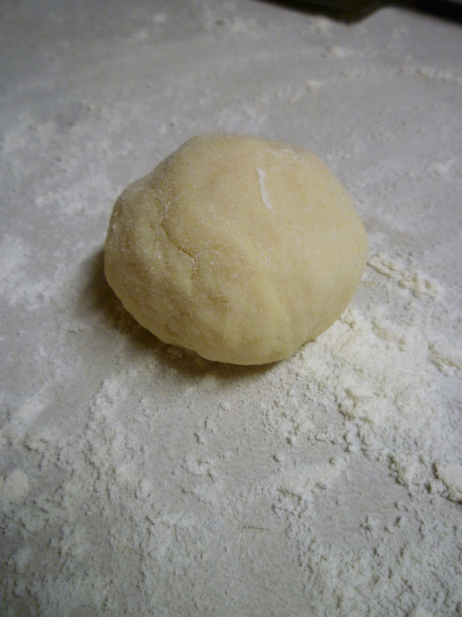 Mix well until the dough has all come together in a loose ball. It could take a little less or a little more water, just let the dough tell you when.