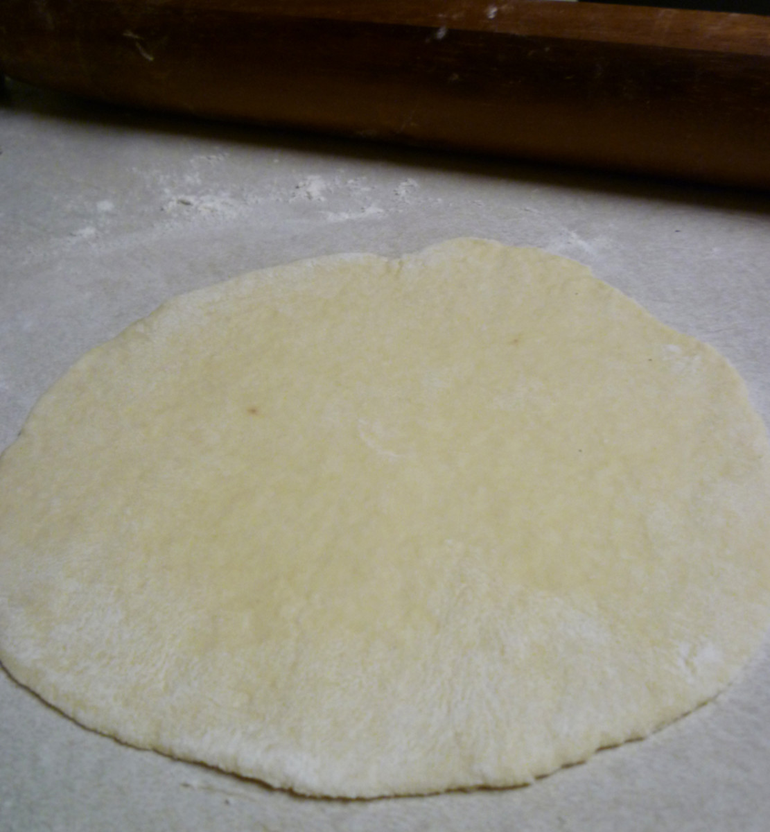 Transfer dough to a well-floured surface and knead for 3-5 minutes. Move back to the bowl, and leave to rest covered at room temperature for 20-25 minutes.