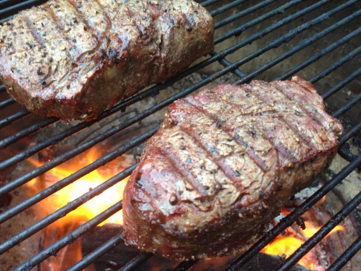 Filet Mignon Searing.  Notice how the flames are extending toward the grill and almost touching the steaks. 