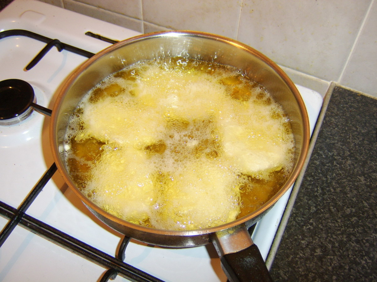 Potato fritters can be cooked in either a deep frying pan or a conventional deep fryer.