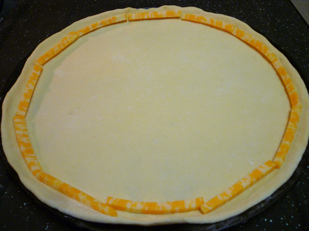 adding cheese for a stuffed crust