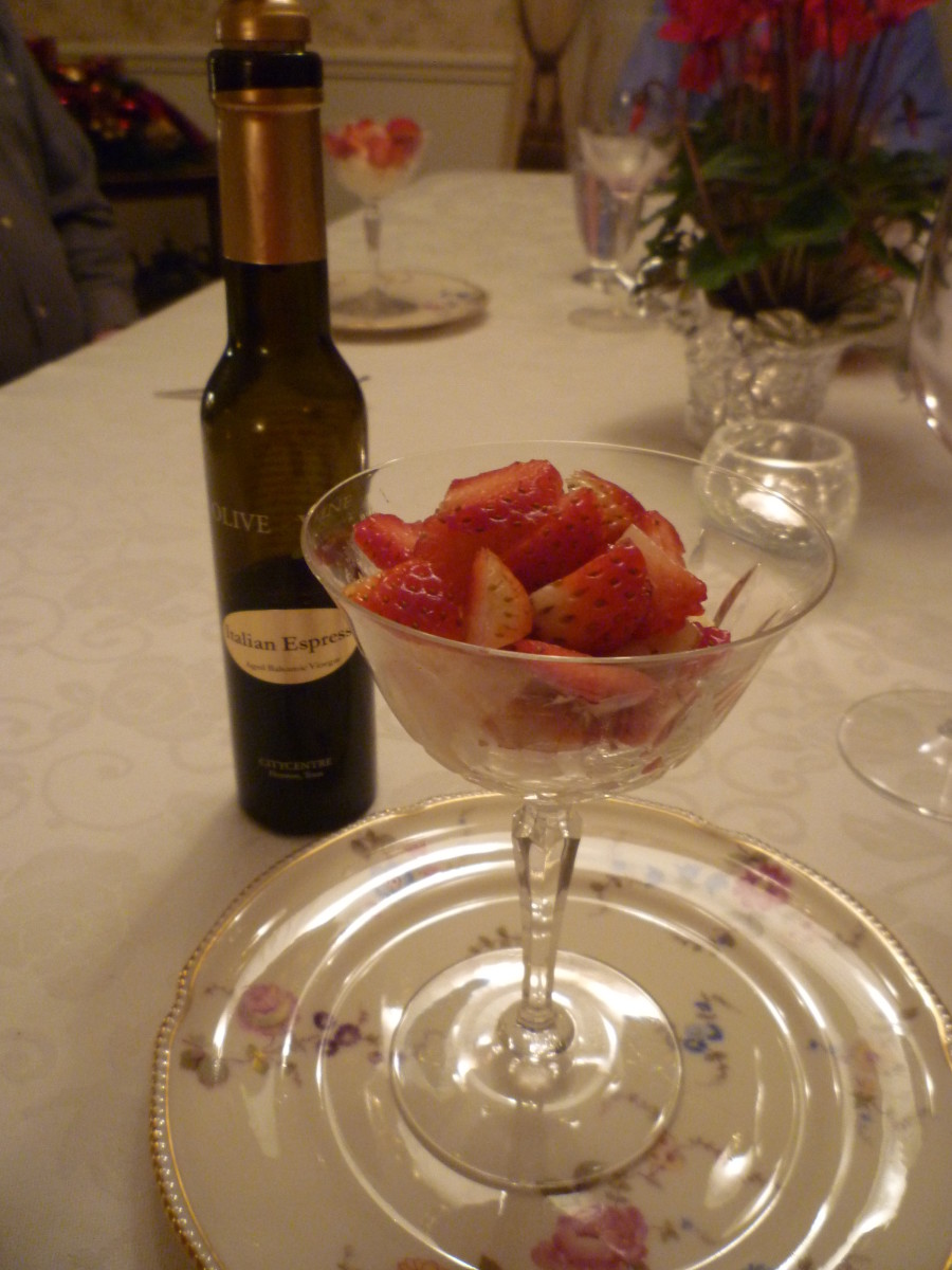 Serving espresso balsamic vinegar over ice cream and strawberries