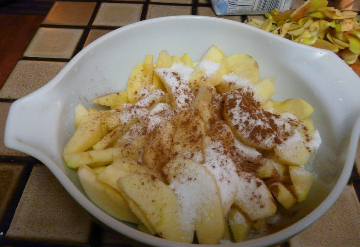 Slice up the apples and toss with sugar and cinnamon